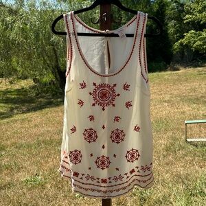 Sundance sleeveless cream colored  tunic with red embroidery. Size medium.